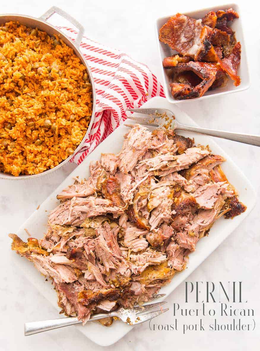 Pernil (Roast Pork Shoulder) is a staple at many Puerto Rican celebrations. Flavored with garlic and herbs and topped with a crunchy chicharrón. #pernil #lechon #lechonasado #roastpork #porkshoulder #PuertoRican #Dominican #Cuban #Nuyorican #navidades #diadeacciondegracias #Christmas #tresreyes #ThreeKingsDay #Thanksgiving #holidaymeals #holidaydinner #holidays #celebrations #partyfood  via @ediblesense