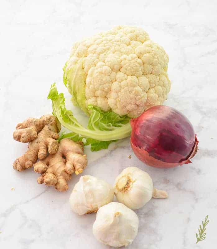 Ingredients for Vegetarian Curried Cauliflower: cauliflower, red onion, garlic, ginger.