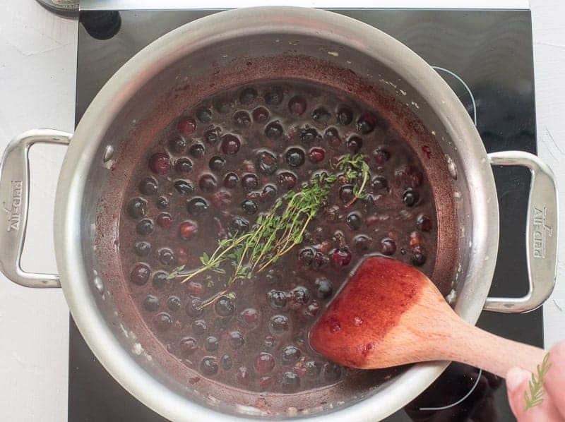 Fresh thyme is added to complete the Blueberry Balsamic BBQ Sauce