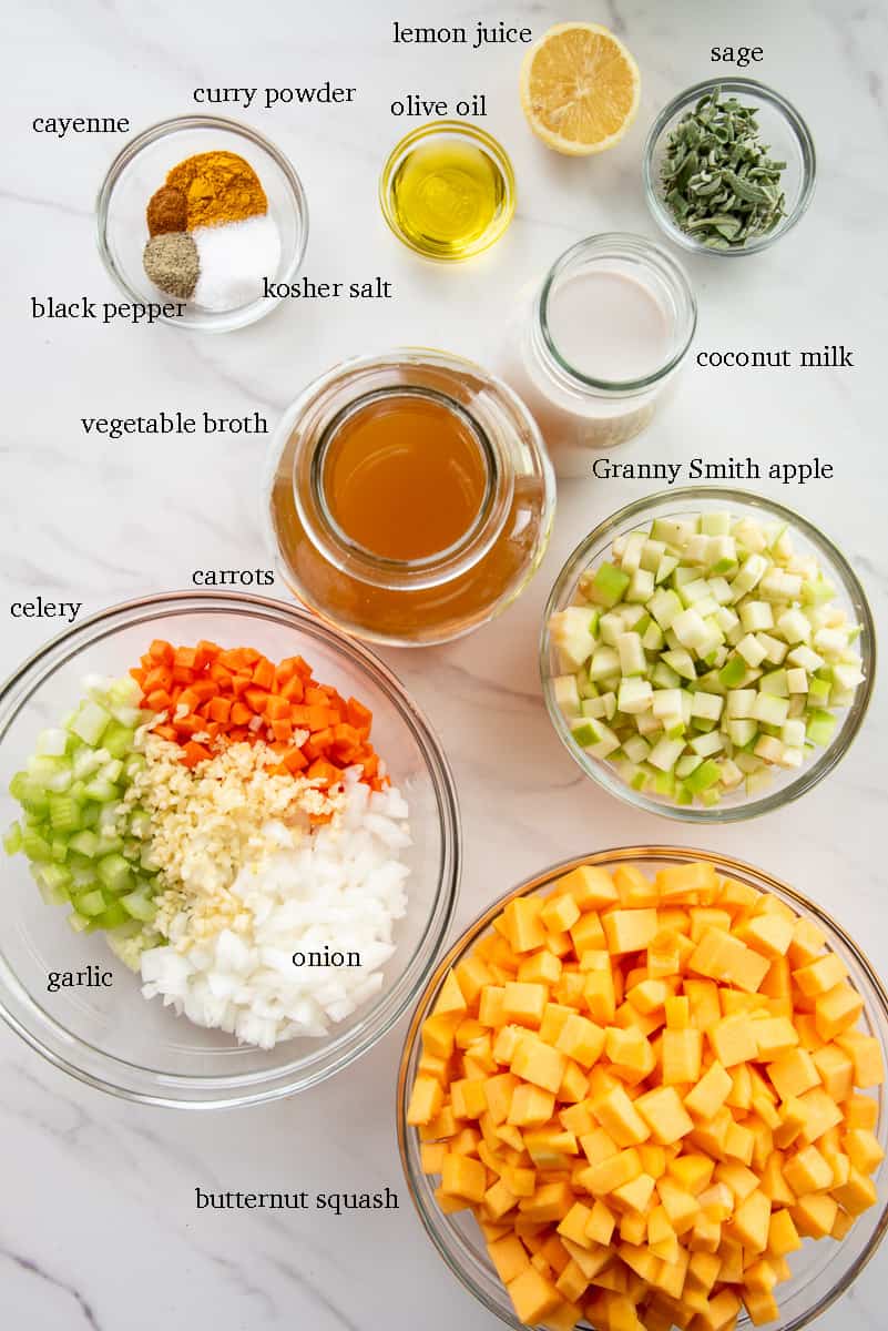 The ingredients needed to make the recipe are labeled on a white countertop.