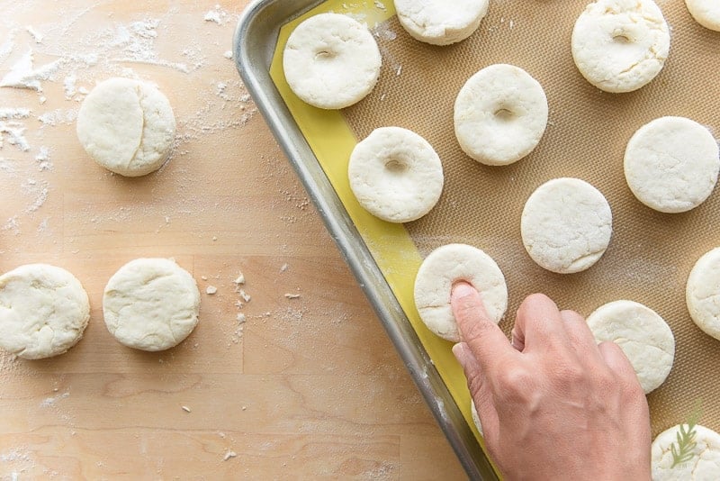 Pressing the center of the biscuits