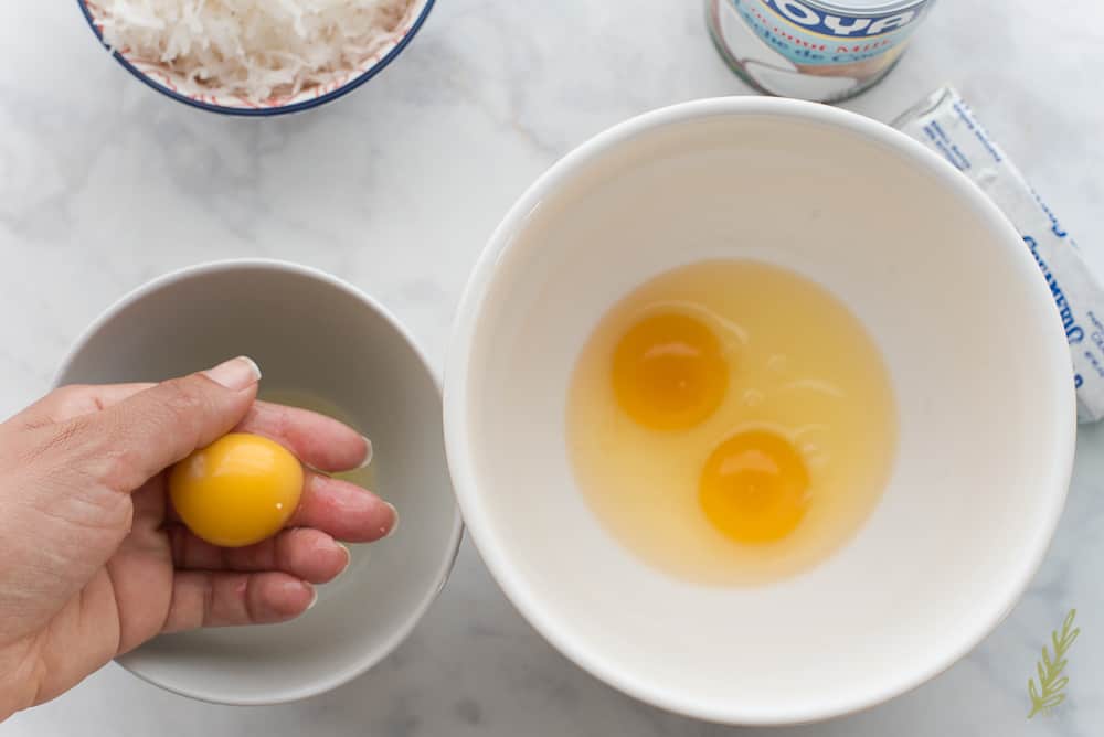 Use your hands to separate egg yolks from their whites