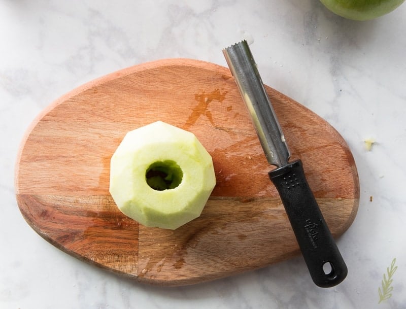 Core the middle of a peeled apple for your Apple-Cranberry Dumplings