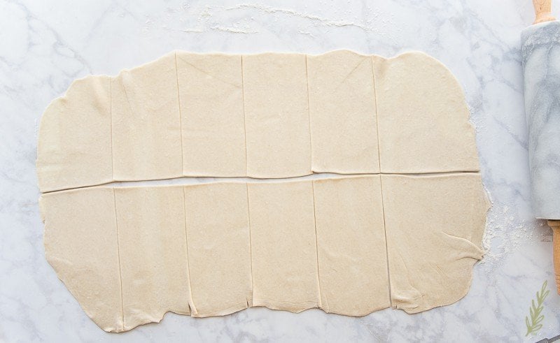 Roll out and cut the puff pastry into 12 rectangles