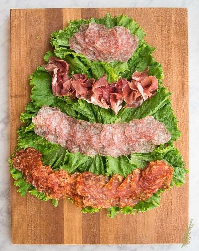 Curl and shingle your preferred charcuterie to create layers
