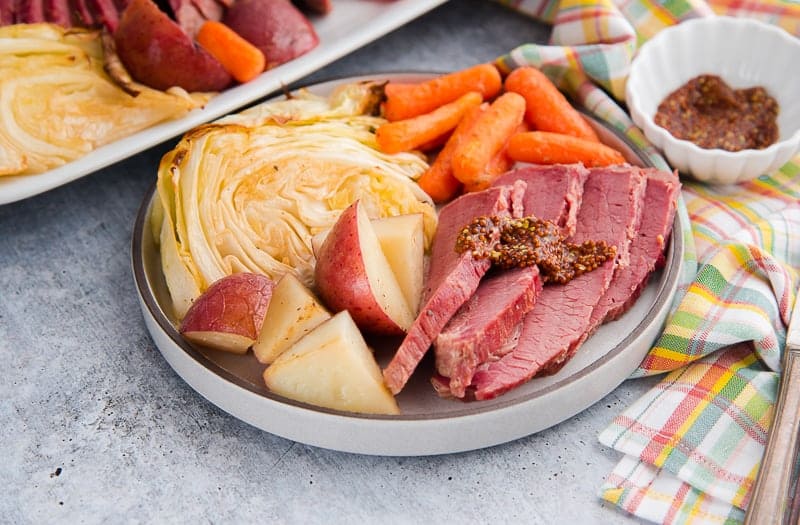 A plate is served with the Corned Beef and Cabbage