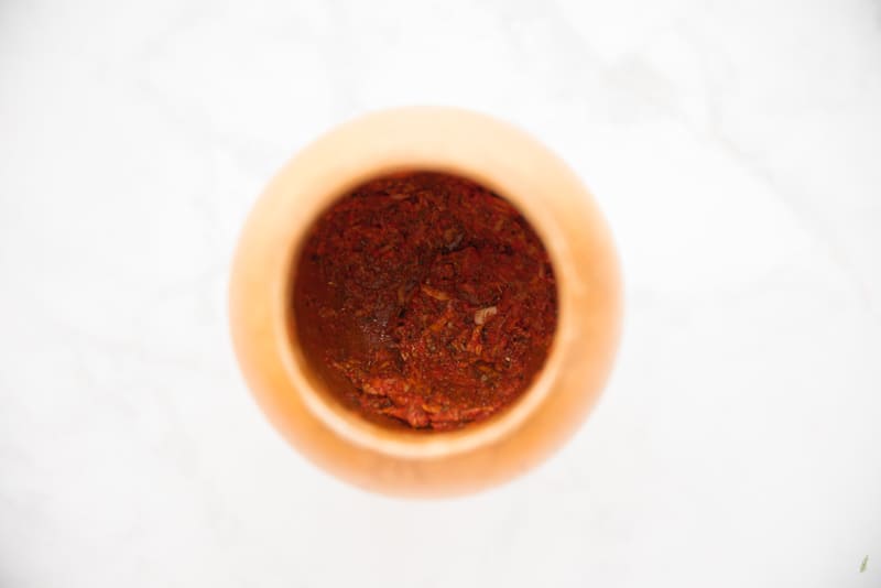 An close up of the garlic and spice paste that will season the Bistec Encebollao