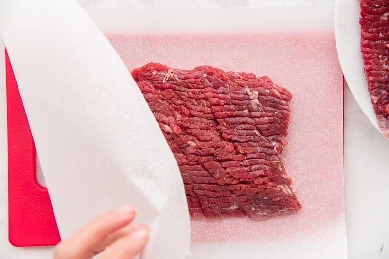 White paper covers a piece of cube steak