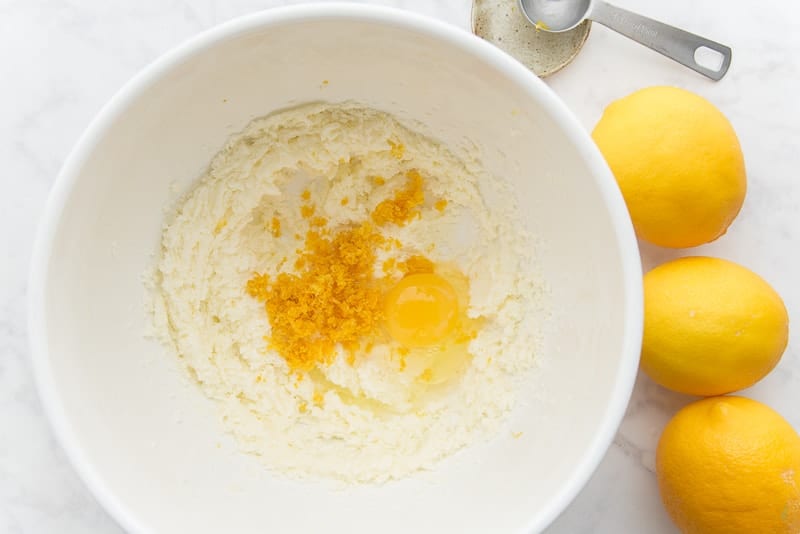 The lemon zest and eggs are added to the butter and sugar mixture