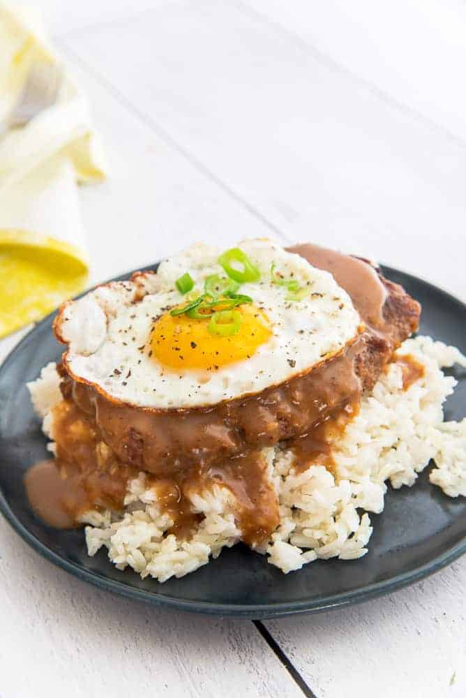 A portrait image of a plate of Loco Moco.