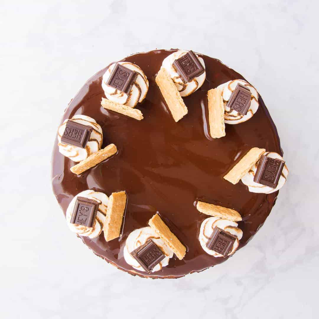 An overhead image of the top of a s'mores cheesecake