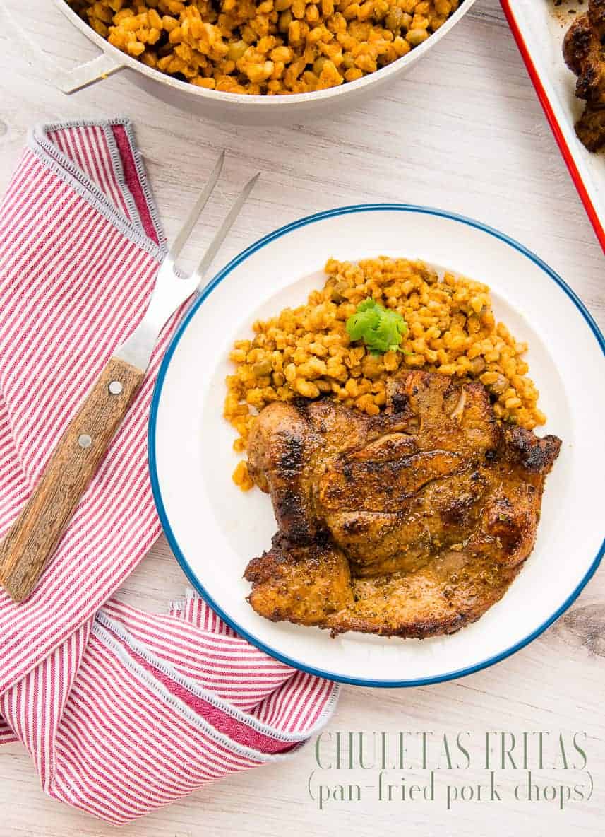 Chuletas Fritas (Pan-Fried Pork Chops) are an easy protein full of Puerto Rican flavor. Herbs and spice make this quickly fried main course something to add to your rotation. #chuletasfritas #chuletafrita #chuletasdecerdo #chuleta #porkchops #pork #meat #panfried #PuertoRican #Dominican #carne #comidacriolla #comidapuertoriqueña #cena #dinner #entree #maindish #easytomake #kidfriendly #keto via @ediblesense