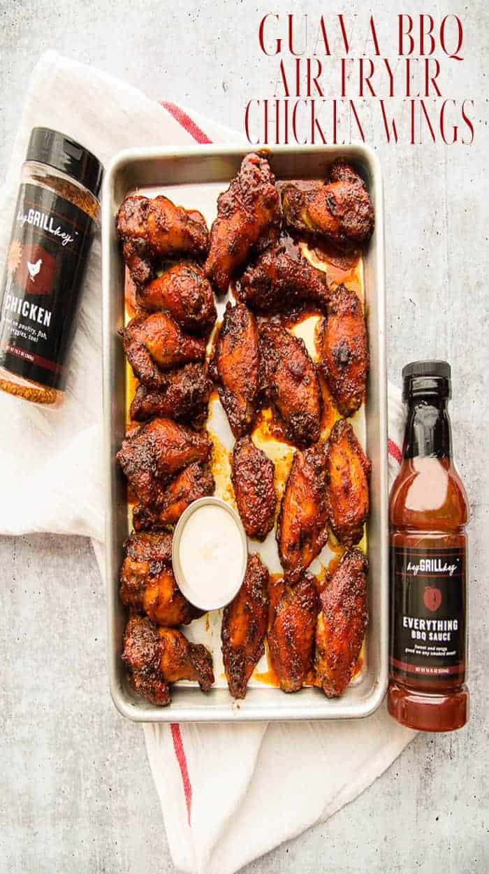 Add a tropical spin to your air fryer wings this weekend! A spice rub and bottled BBQ sauce make this flavorful recipe a breeze to whip up. #airfryerrecipe #airfryerwings #chickenwings #airfried #airfriedwings #buffalowings #heygrillhey #patioprovisions #everythingbbqsauce #guavarecipe #chickenrecipes #buffalowingrecipe #guavaBBQsauce #kid-friendly #easymeals #dinner #gameday #footballsnacks via @ediblesense