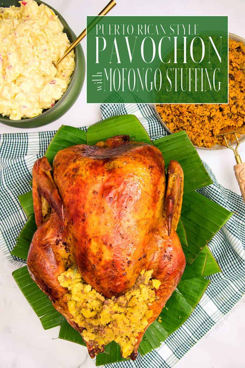 Pavochon is a turkey seasoned like a lechon and stuffed with a garlicky plantain mashed concoction. It's the tastiest Puerto Rican way to switch up your Thanksgiving dinner this year. #pavochon #roastturkey #lechon #PuertoRican #roast #Thanksgiving #holidayrecipe #holidaydinner #mofongo #mofongostuffing #platanos #plantains #chicharrones #porkrinds #comidacriolla #comidapuertorriqueña #PuertoRicanholidayrecipes #maincourse #dinner #recipesforturkey via @ediblesense