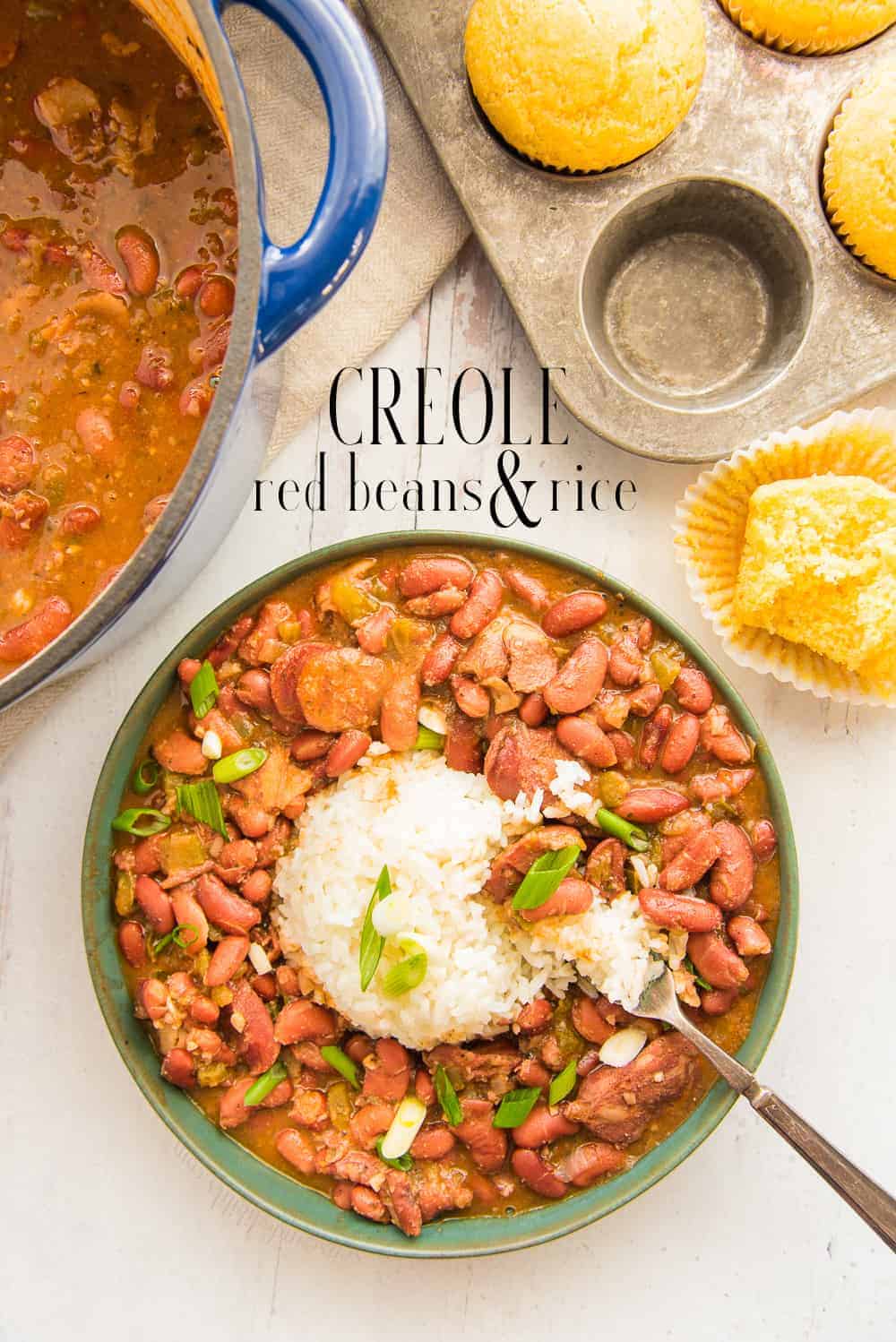 Creole Red Beans and Rice are a meal in themselves. Savory kidney beans are simmered with aromatics, bacon, and sausage to make an inexpensive, yet filling meal. #redbeansandrice #kidneybeans #creolerecipe #cajunrecipe #MardiGrasrecipe #soulfoodrecipe #southernrecipe #andouillesausage #beansandrice #arrozconhabichuelas #habichuelasguisadas #frijoles #frijolesconarroz #cooking #onepotrecipe via @ediblesense