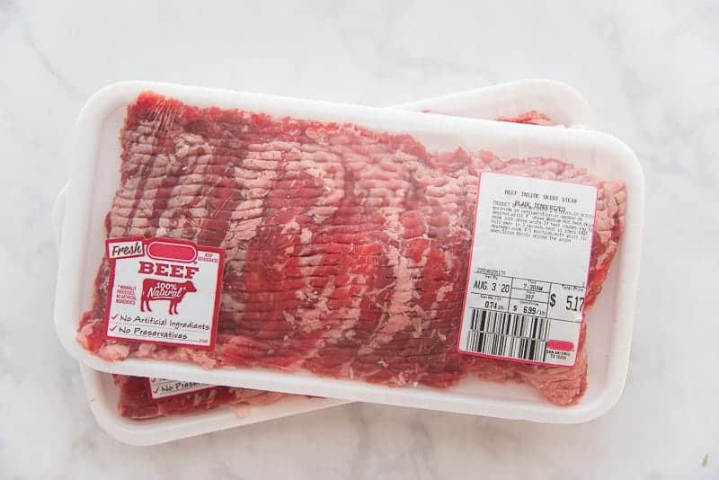 The cut of meat for the sandwiches is shown in package from the grocery store.