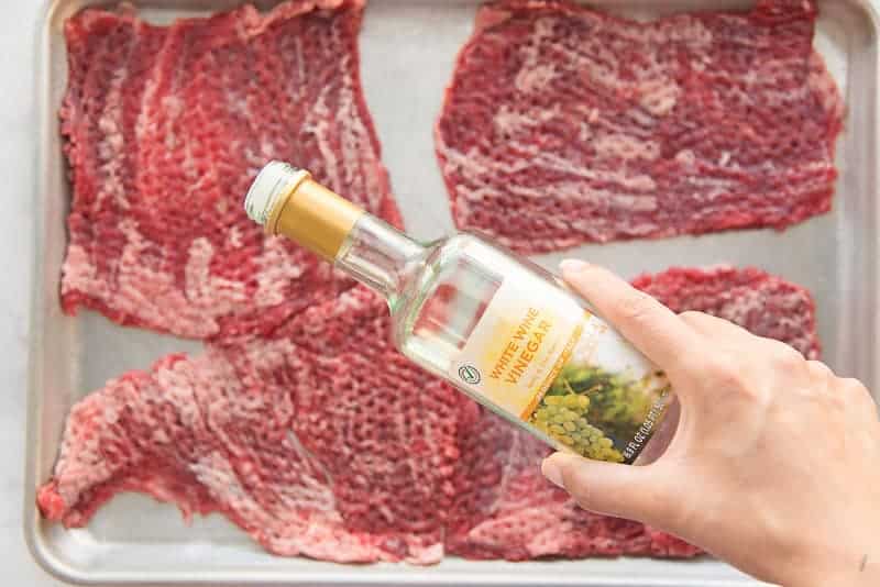 White wine vinegar is used to marinate the cube steaks