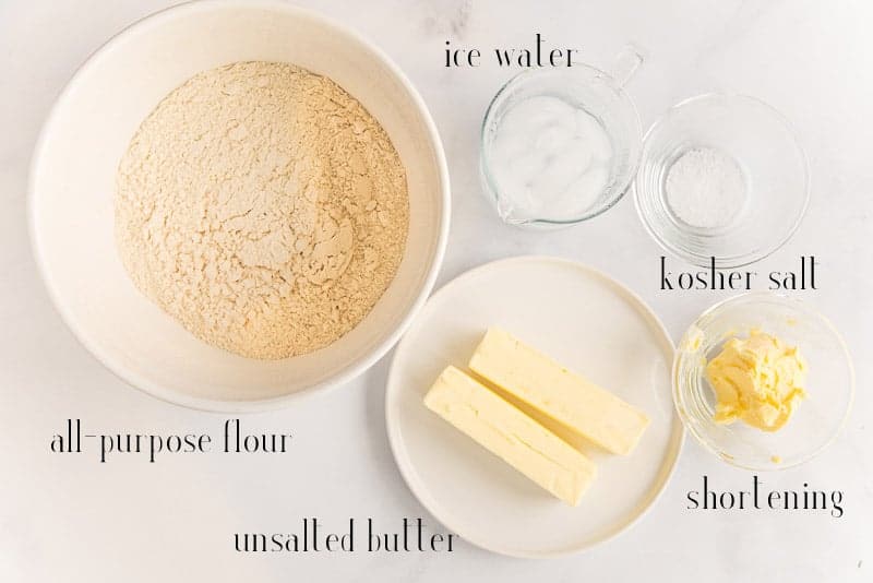 Ingredients for Flaky Pie Dough: all-purpose flour, ice water, kosher salt, shortening, unsalted butter