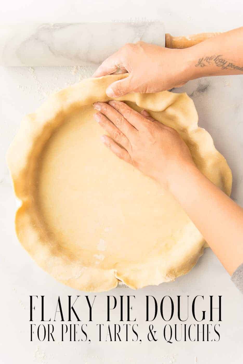 Flaky pie dough is easier to makes at home than you may think. Use this buttery dough for all of your pie, tarts, or quiche recipes. #piedough #pierecipe #tartdough #quichedough #baking #pie #tarts #pastelillos #empanadillas #quiche #quichelorraine #makingpies #holidaypie #piedoughrecipe #recipeforpiedough #butterpiedough #flakypiedoughrecipe #recetasdepai #applepierecipe #quichelorraine #fruittart #bakingfundamentals #twocrustpiedoughrecipe via @ediblesense