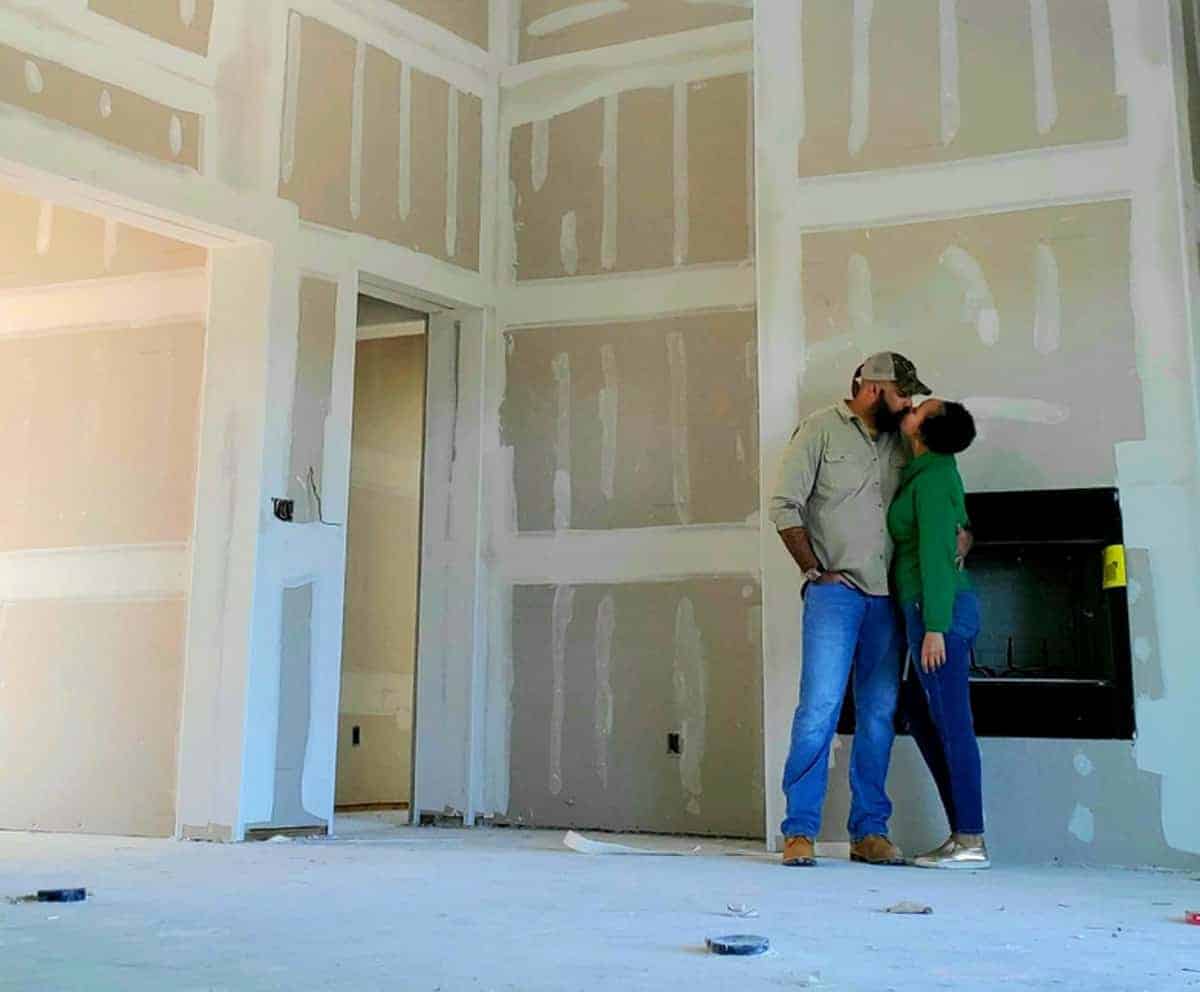 Preview of the Framing and Building Phase of a Custome home Build two people kissing.
