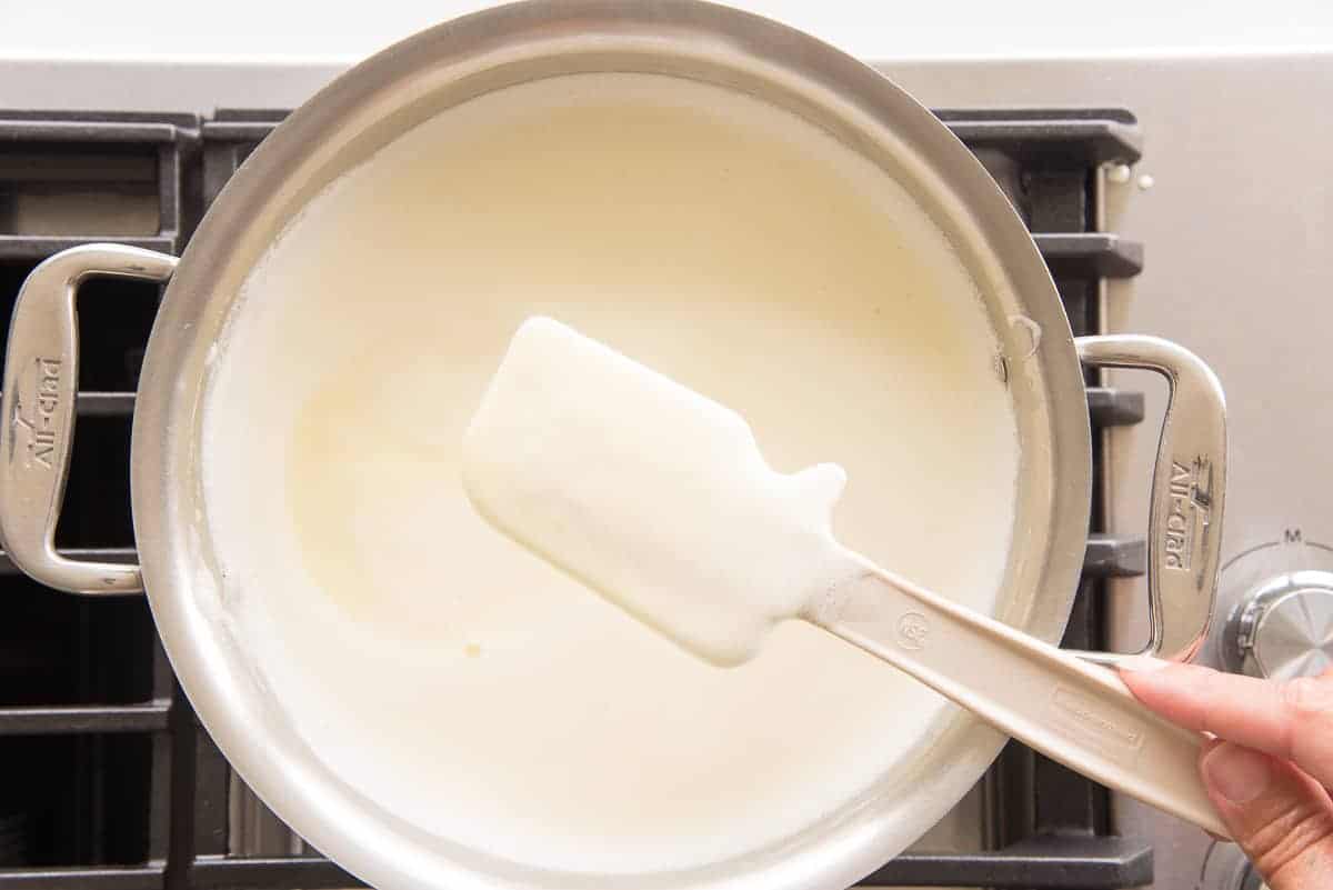 The custard is thickened to coat the spatula.