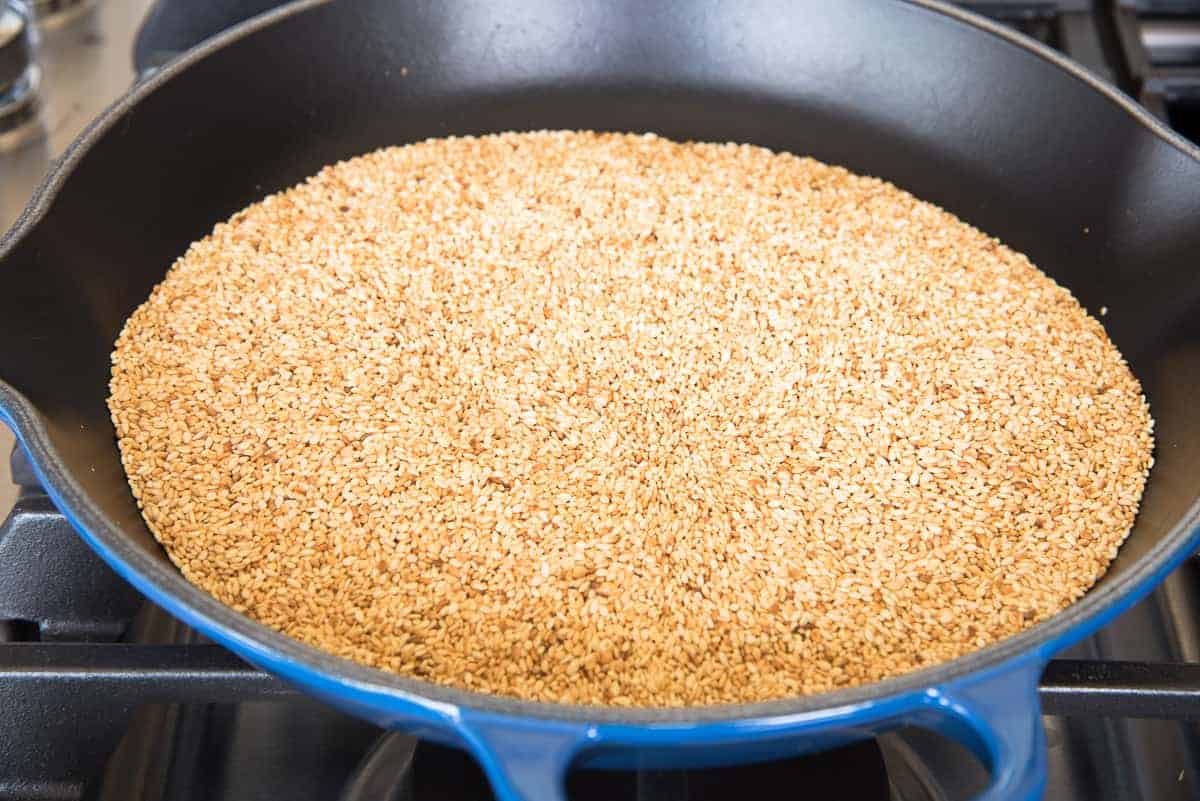 The toasted sesame seeds in a pan.
