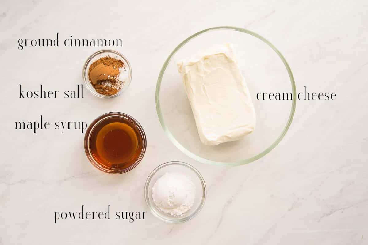 Ingredients to make Maple Cinnamon Cream Cheese Glaze: ground cinnamon, kosher salt, maple syrup, powdered sugar, and cream cheese.