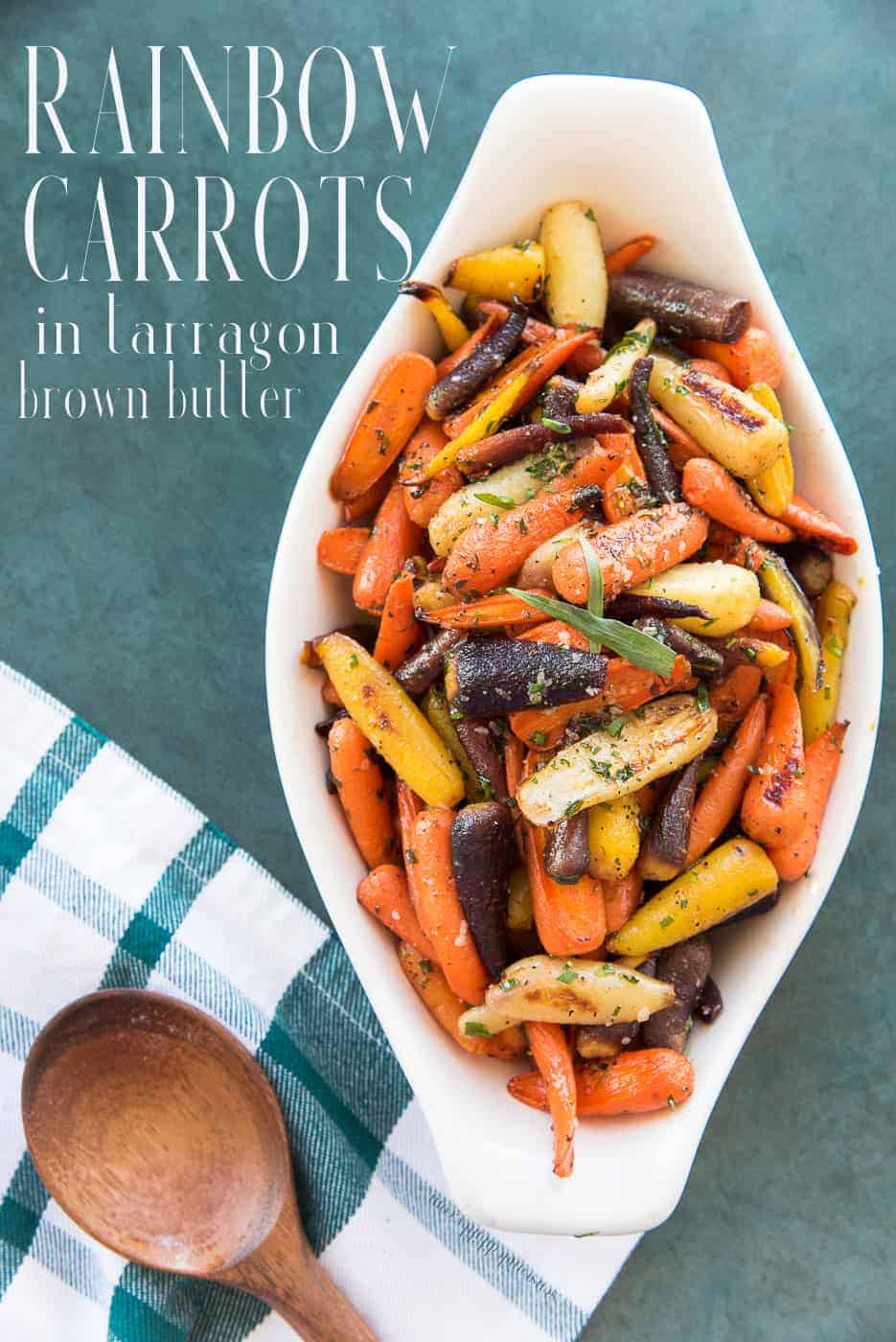 Make this easy side dish for your next Sunday or Holiday Dinner. Colorful rainbow carrots are roasted until tender, then tossed in a nutty, tarragon butter sauce. It's simple and delicious. #carrots #babycarrots #carrotrecipe #tarragon #freshherbs #roastedvegetables #roastedcarrots #holidaysides #holidaysidedish #sidedish #holidayrecipe #Easter #thanksgiving #Christmas #zanahorias #nochebuena #cooking #accompaniments  via @ediblesense