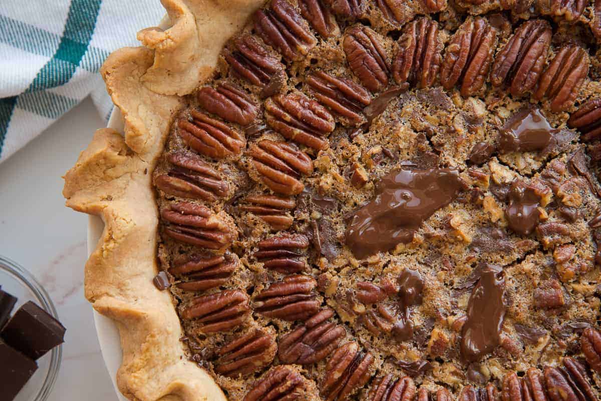 Close up, horizontal image of the top of the baked Maple Bourbon Pecan Pie with Chocolate Chunks