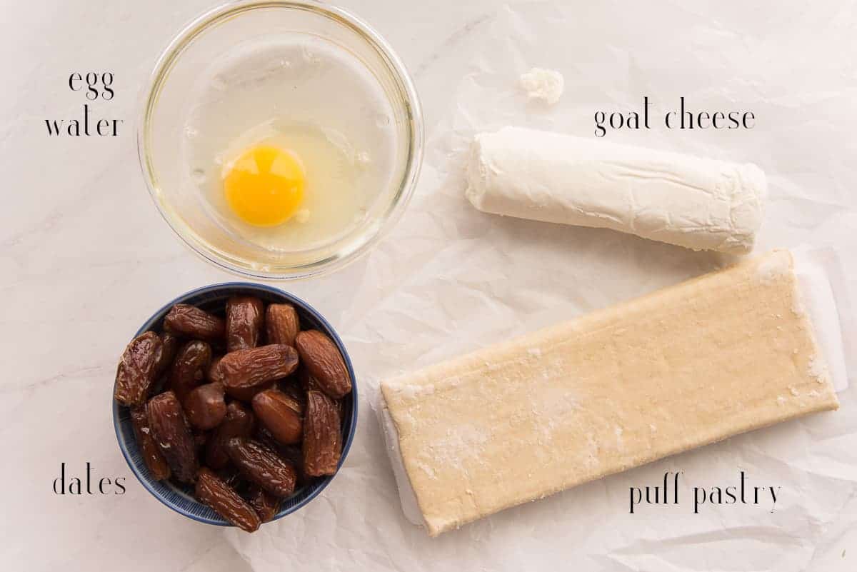Ingredients for the recipe: egg, water, goat cheese, puff pastry, and dates.
