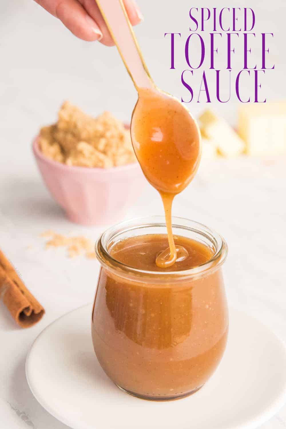 This Spiced Toffee Sauce is buttery, creamy, and flecked with warm spices. Use it as a dessert topping or stir it into your favorite warm or chilled drinks. It's a great way to elevate basic desserts or drinks. #toffeesauce #dessertsauce #sauce #brownsugar #butter #stickytoffeepudding #drinkflavorings #caramel #dessert #drinks #desserttopping #icecreamrecipe #cheesecakerecipe #syrup via @ediblesense