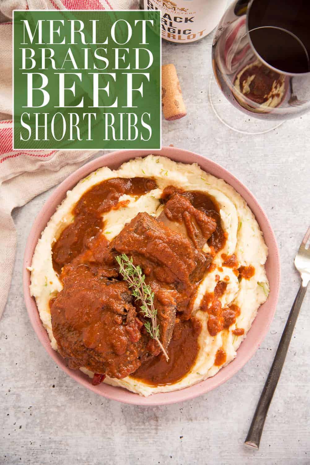 Merlot Braised Beef Short Ribs are succulent beef ribs simmered low and slow in a rich merlot and tomato-based sauce. This is the ultimate comfort dish and it's a one pot recipe, too! Serve it over mashed potatoes, boiled pasta, or creamy grits. #beefshortribs #shortribsrecipe #beefrecipe #cookingbeef #beef #merlot #cookingwithwine #braising via @ediblesense
