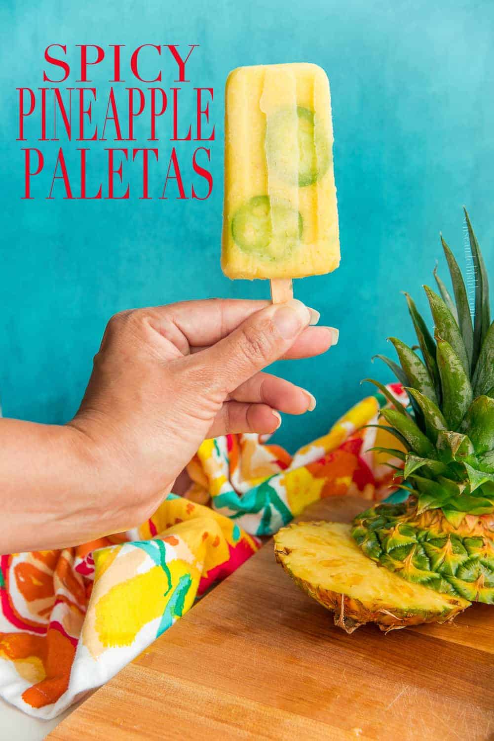 Spicy Pineapple Paletas are made with fresh pineapple and given a bit of heat from fresh jalapeños. Be sure to use ripe pineapples for the best flavors. Completely all natural. #paletas #CincodeMayo #popsicles #icepops #Summerdesserts #fruitdesserts #icecream #sorbet via @ediblesense
