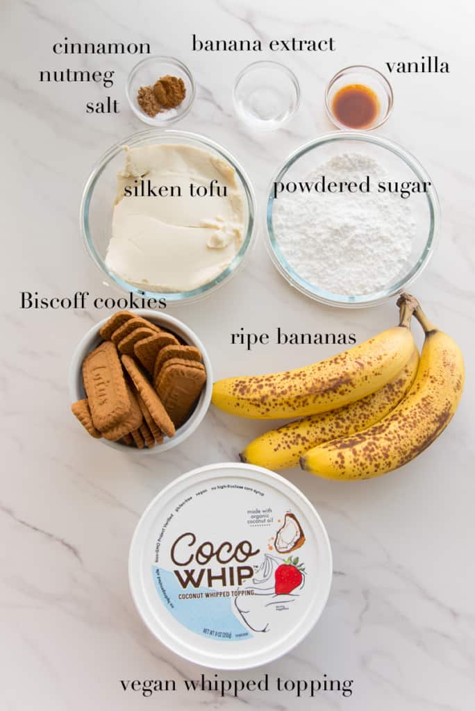 The ingredients to make the Vegan Banana Pudding are on a white countertop.