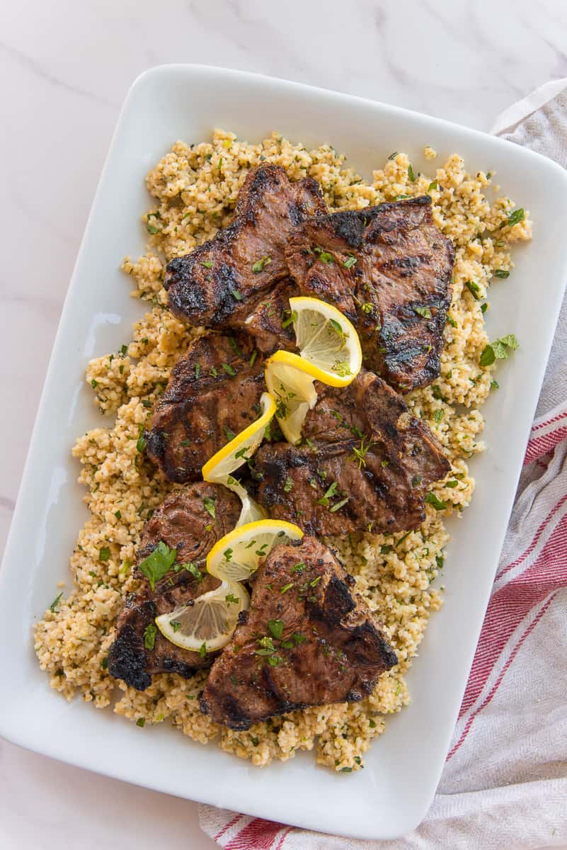 The Garlic Herb Grilled Lamb Chops on a bed of grains.
