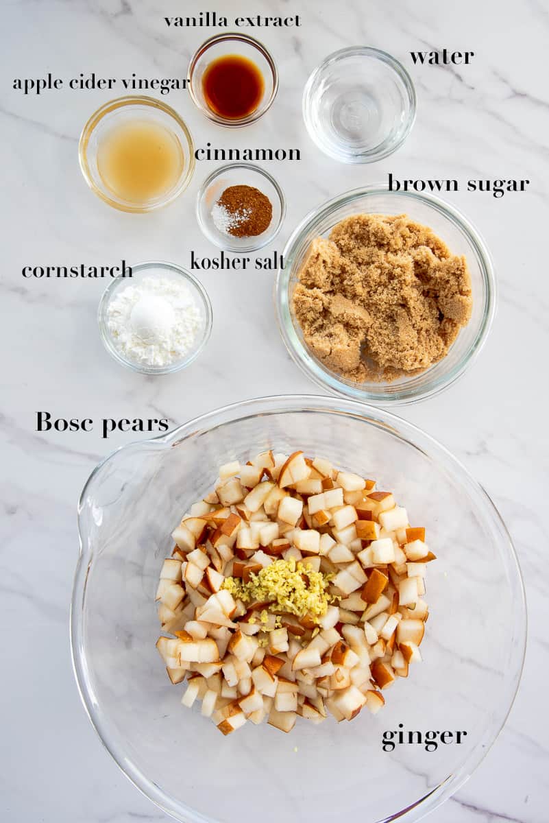 The ingredients needed to make the recipe are labeled and on a white countertop.