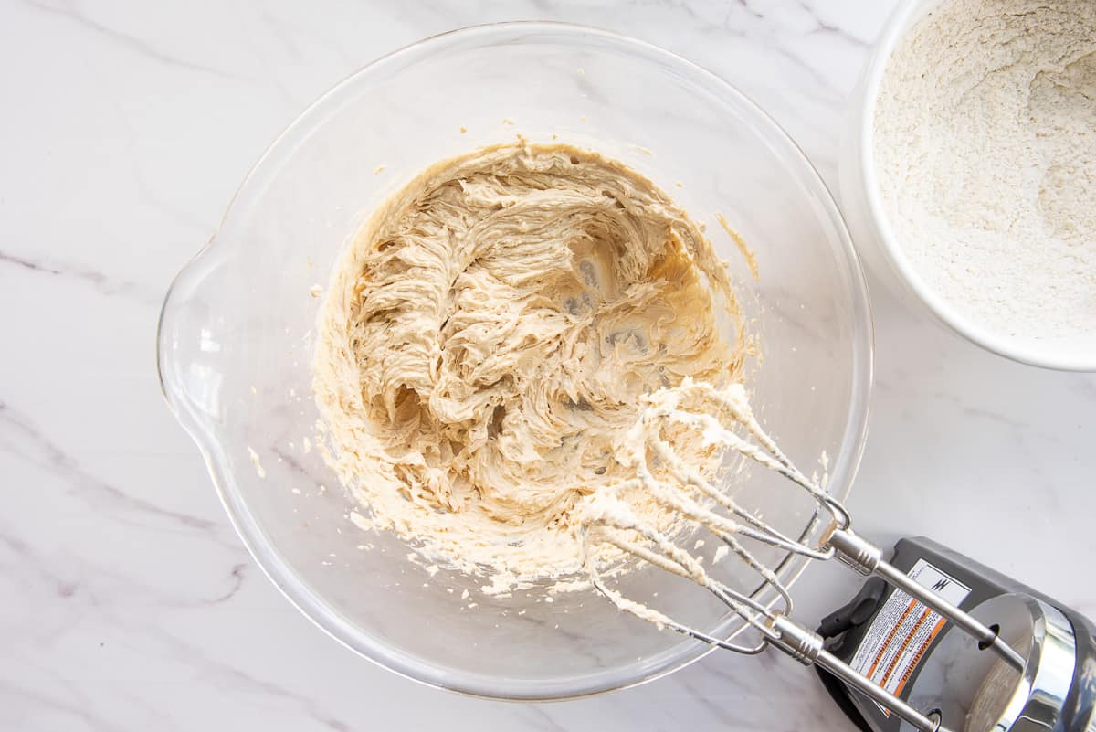 The dry ingredients are gradually added to the wet with an electric mixer.