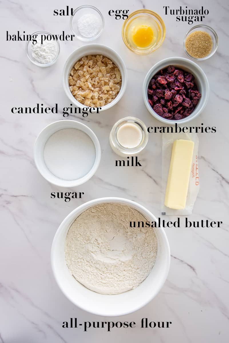 The ingredients to make the Cranberry Ginger Scones on a white countertop