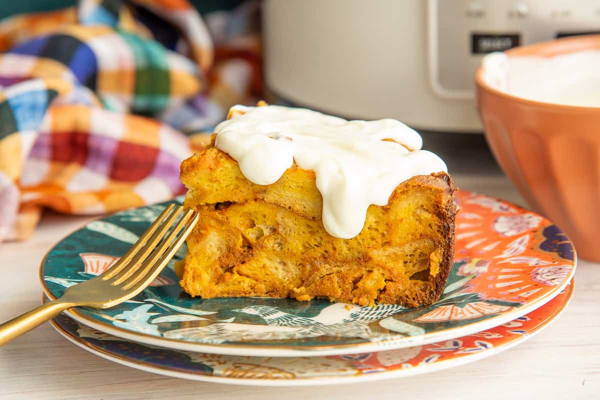 Cream Cheese Glaze coats a serving of Slow Cooker Pumpkin French Toast.