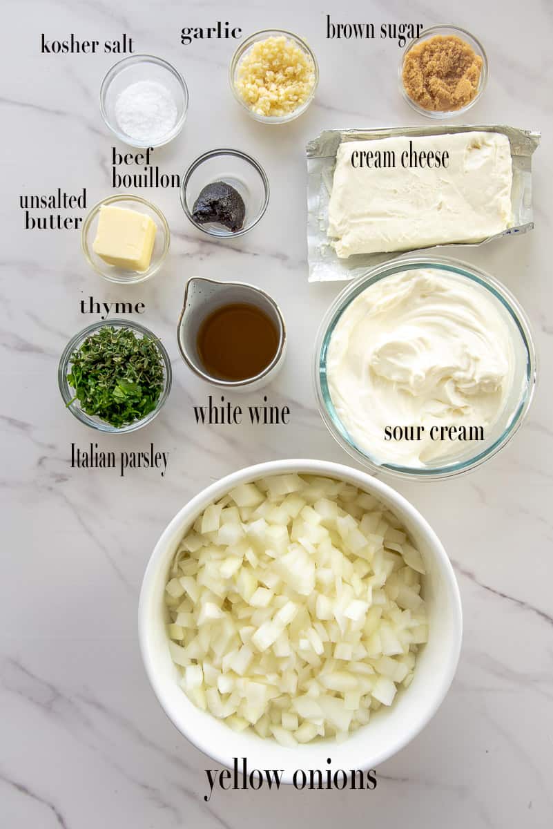 The ingredients to make the recipe are labeled on a white countertop.