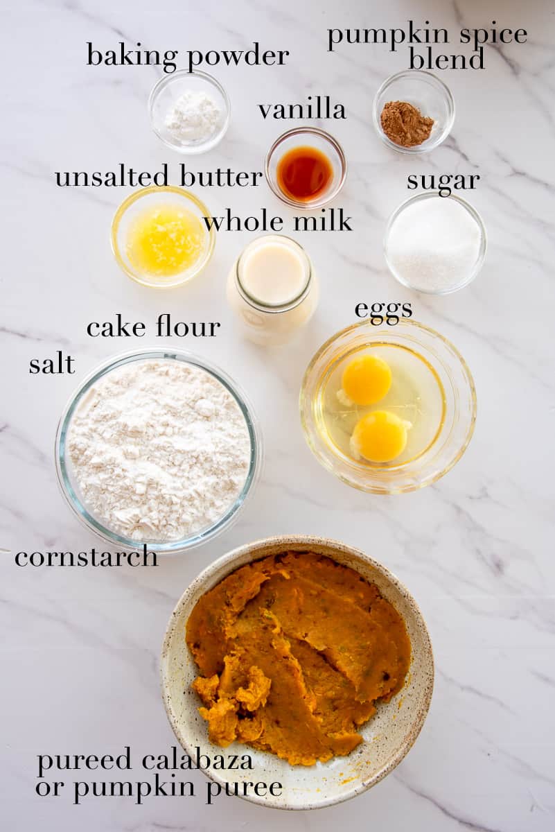 The ingredients needed to make Barriguitas de Vieja are labeled on a white countertop.