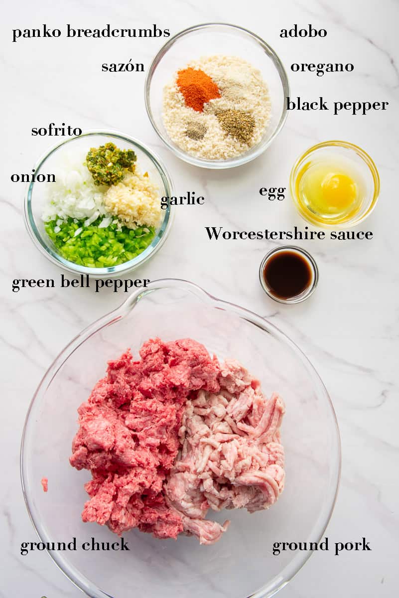 The ingredients to make the party meatballs are on a white countertop labeled in black text.