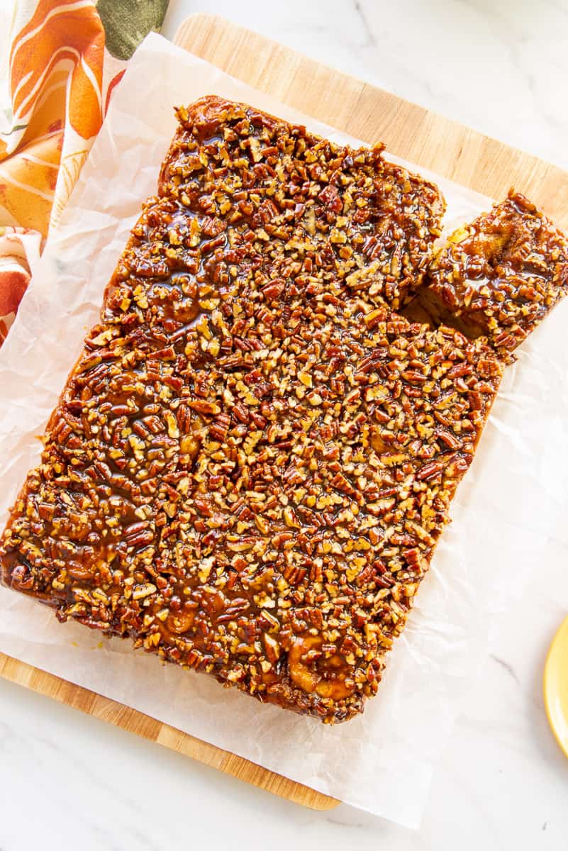 The pecan caramel layer covers the pumpkin rolls after they're turned out of the baking dish.