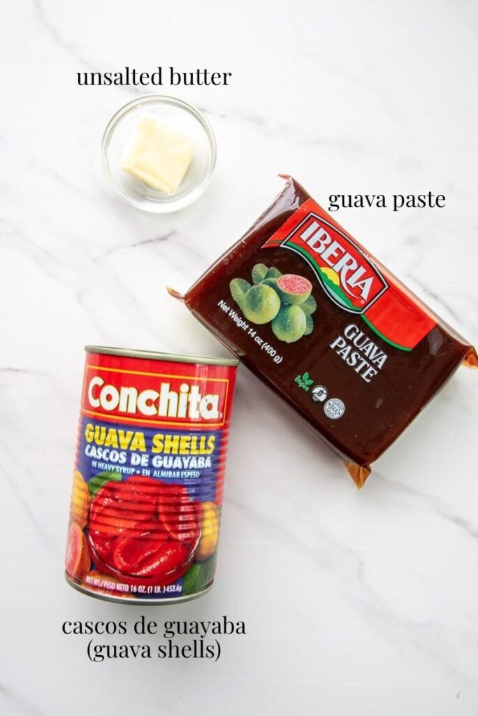 The ingredients needed to make the guava topping are labeled on a white countertop.