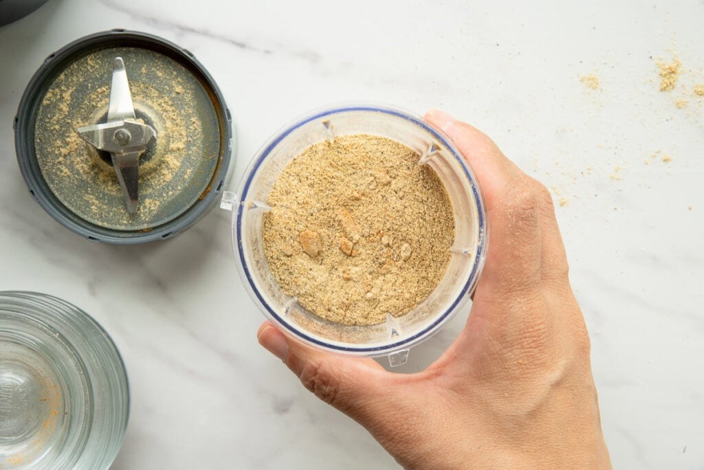 The ground seasoning blend in the spice mill.