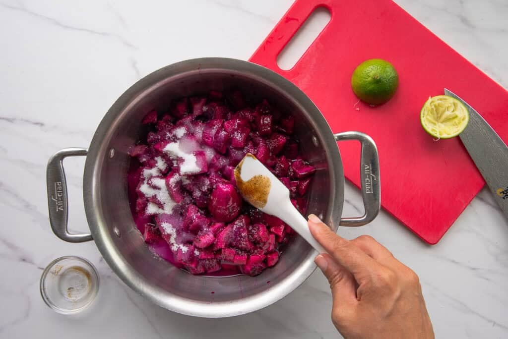 Vanilla bean past and kosher salt are added to the pot with the chopped fruit.