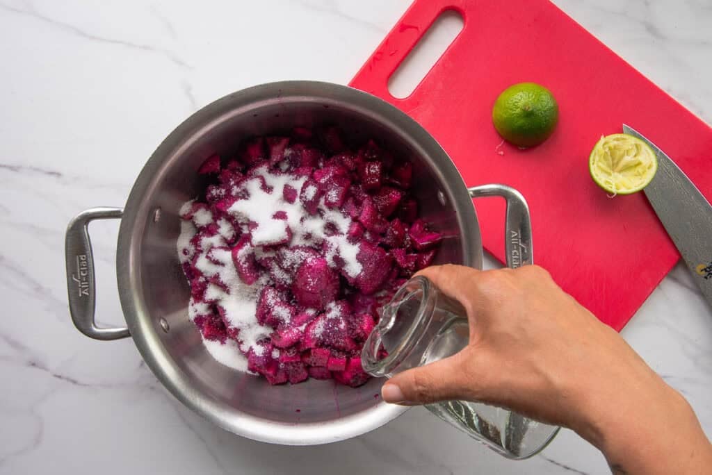 Water is added to the pot with the rest of the ingredients.